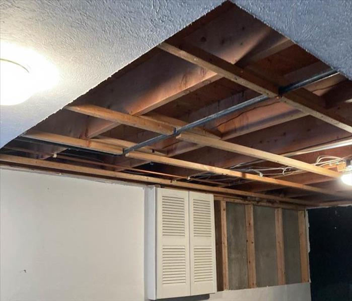 Demoed ceiling due to pipe burst.