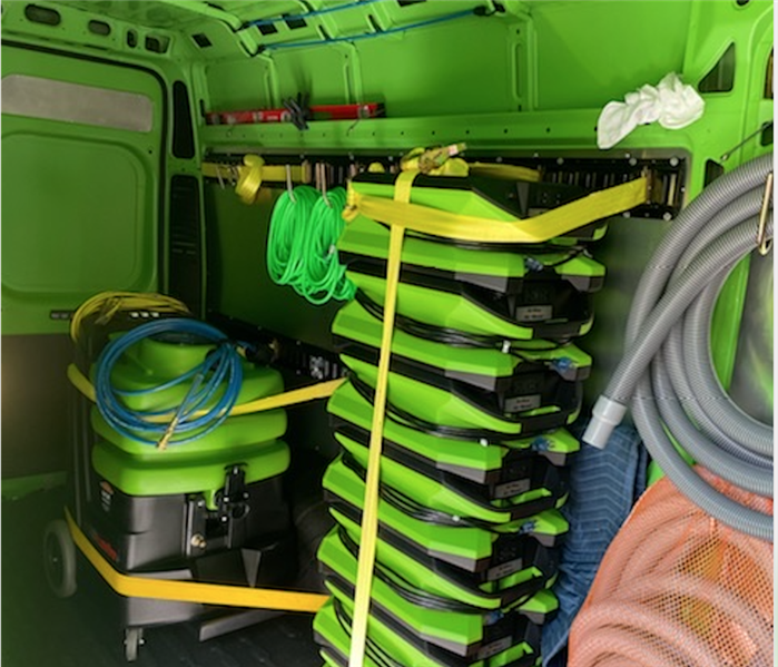 Drying equipment packed up in a SERVPRO van.